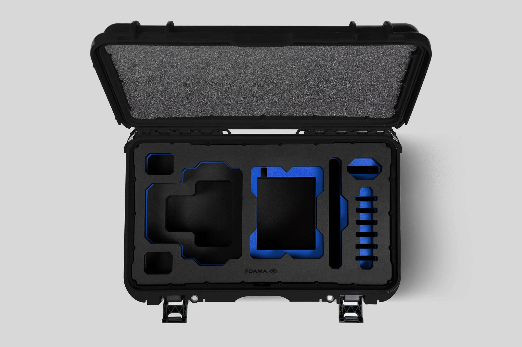 Top View of a Red Raptor-X Black Color Carry-on Case with Custom Blue Foam Insert