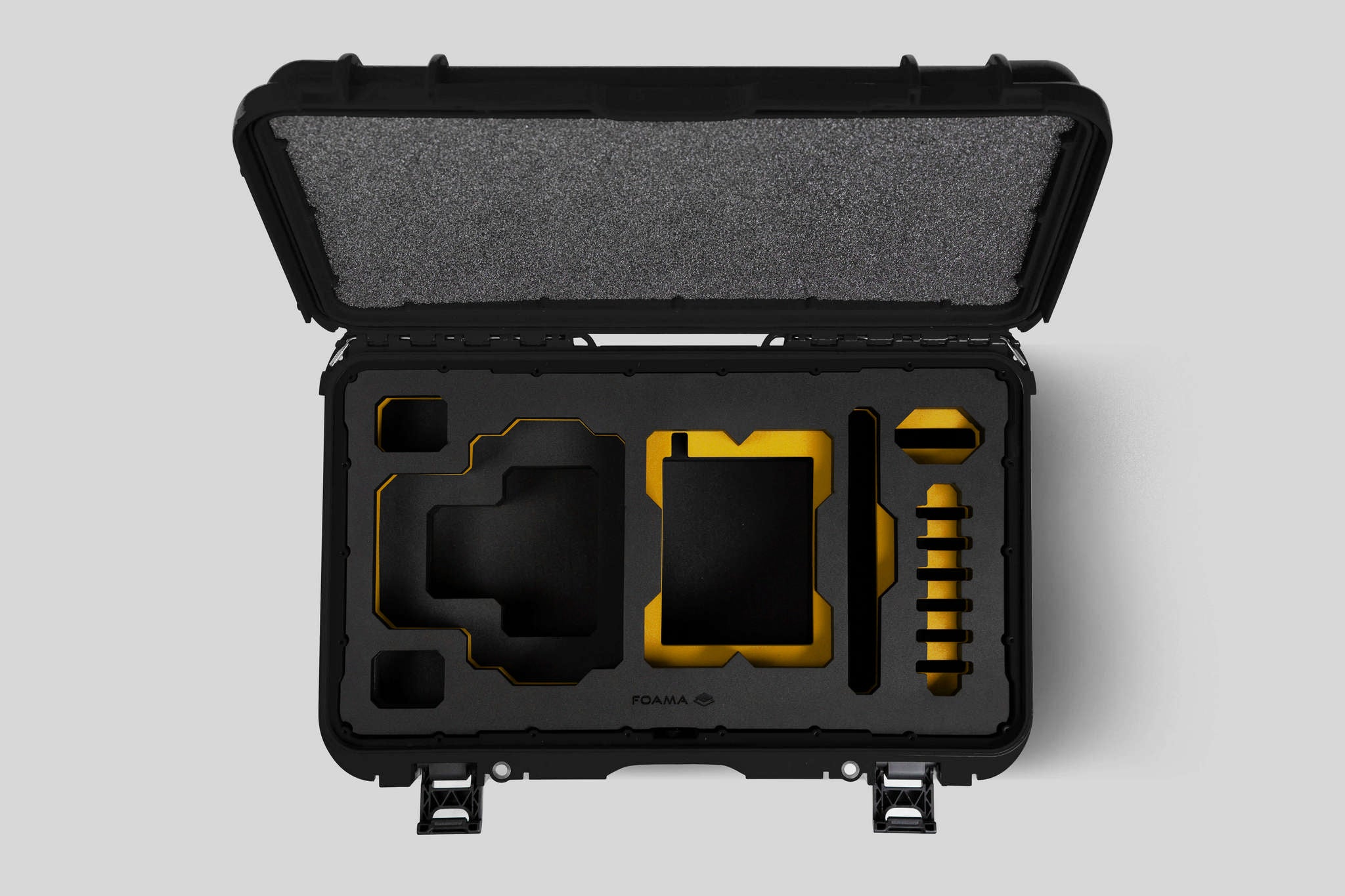 Top View of a Red Raptor-X Black Color Carry-on Case with Custom Yellow Foam Insert