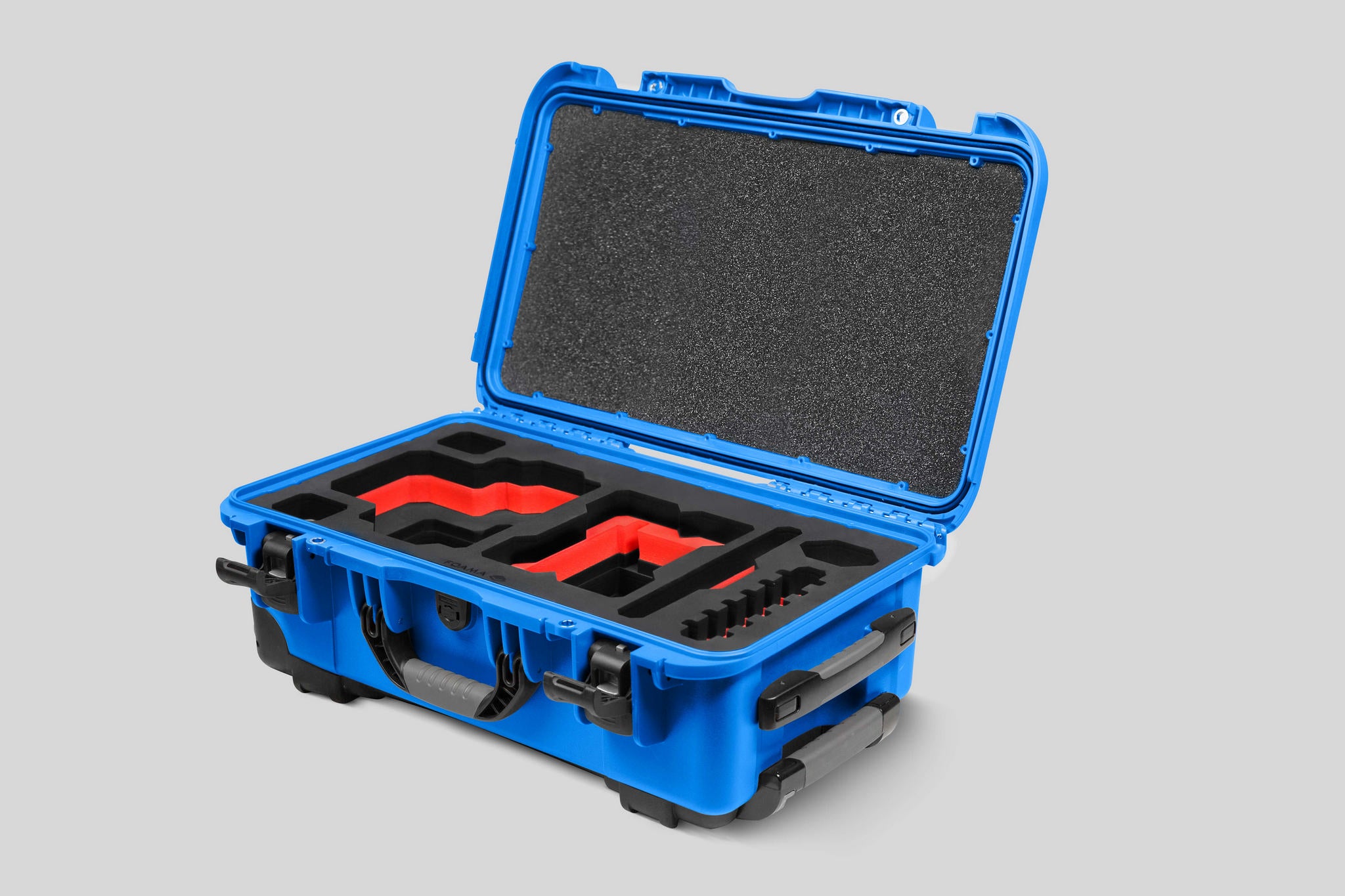 Angled View of a Red Raptor-X Blue Color Carry-on Case with Custom Red Foam Insert