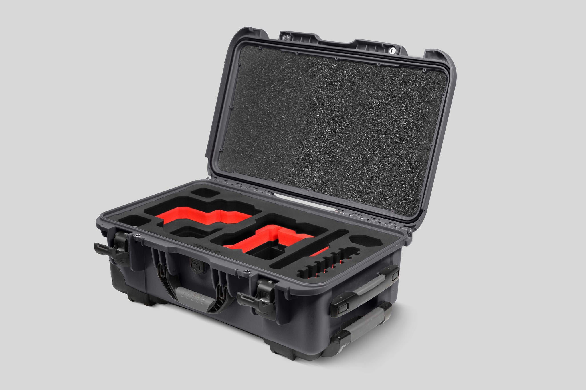 Angled View of a Red Raptor-X Graphite Color Carry-on Case with Custom Red Foam Insert