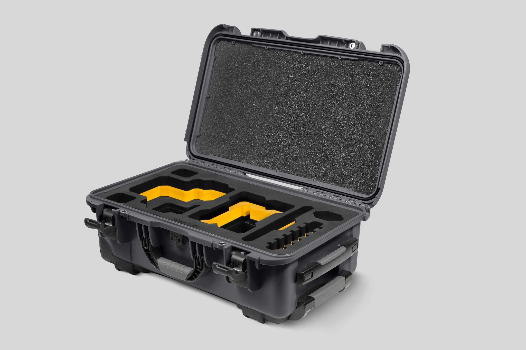 Angled View of a Red Raptor-X Graphite Color Carry-on Case with Custom Yellow Foam Insert