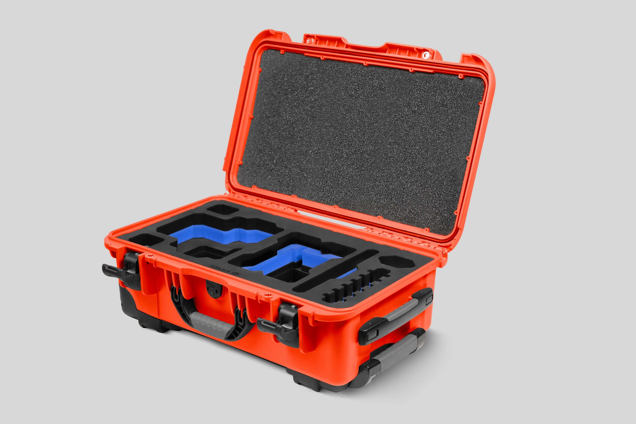 Angled View of a Red Raptor-X Orange Color Carry-on Case with Custom Blue Foam Insert