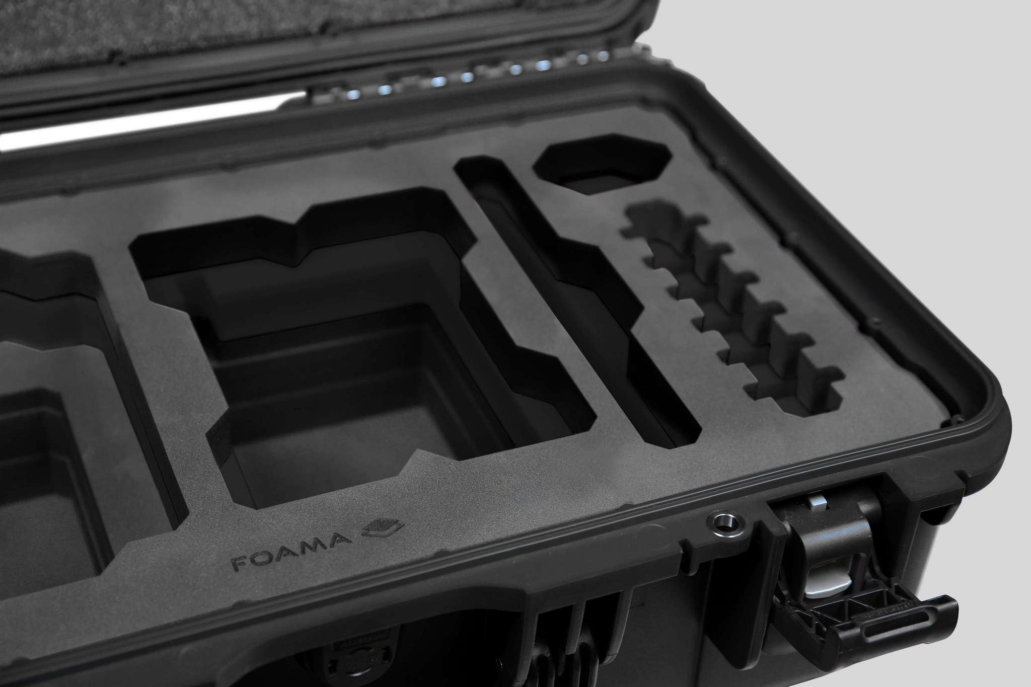 Close-up view 1 of a Red Raptor-X Black Color Carry-on Case with Custom Black Foam Insert