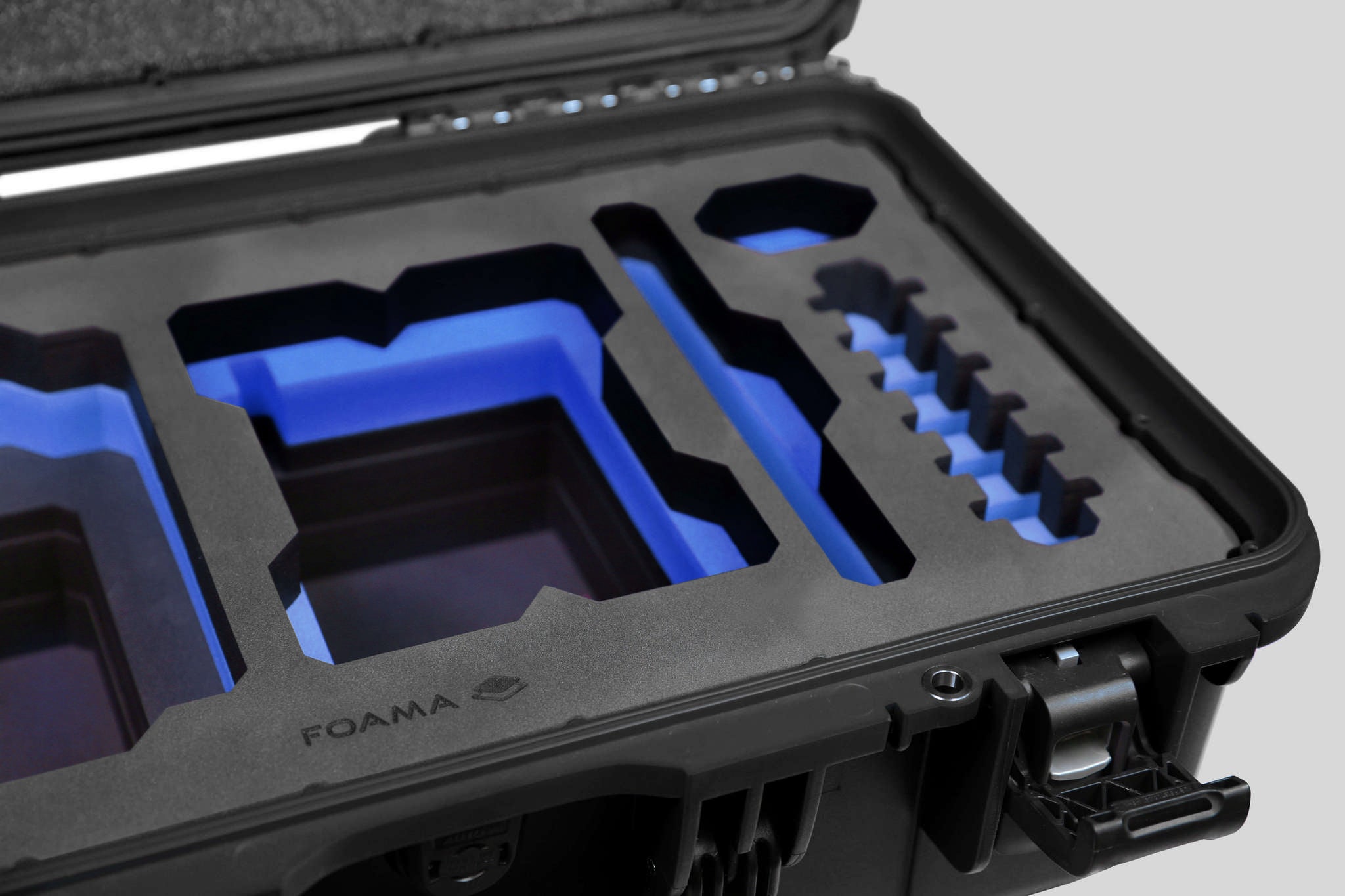 Close-up view 1 of a Red Raptor-X Black Color Carry-on Case with Custom Blue Foam Insert