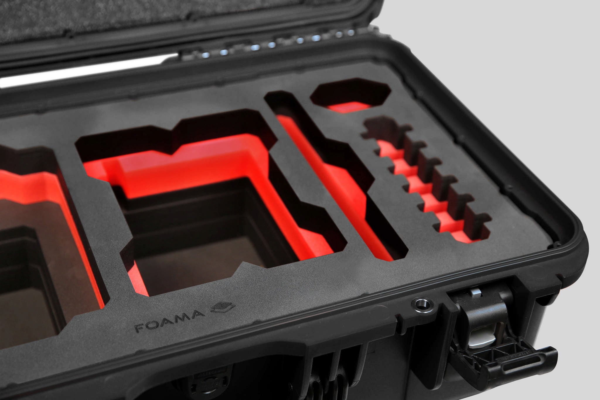 Close-up view 1 of a Red Raptor-X Black Color Carry-on Case with Custom Red Foam Insert