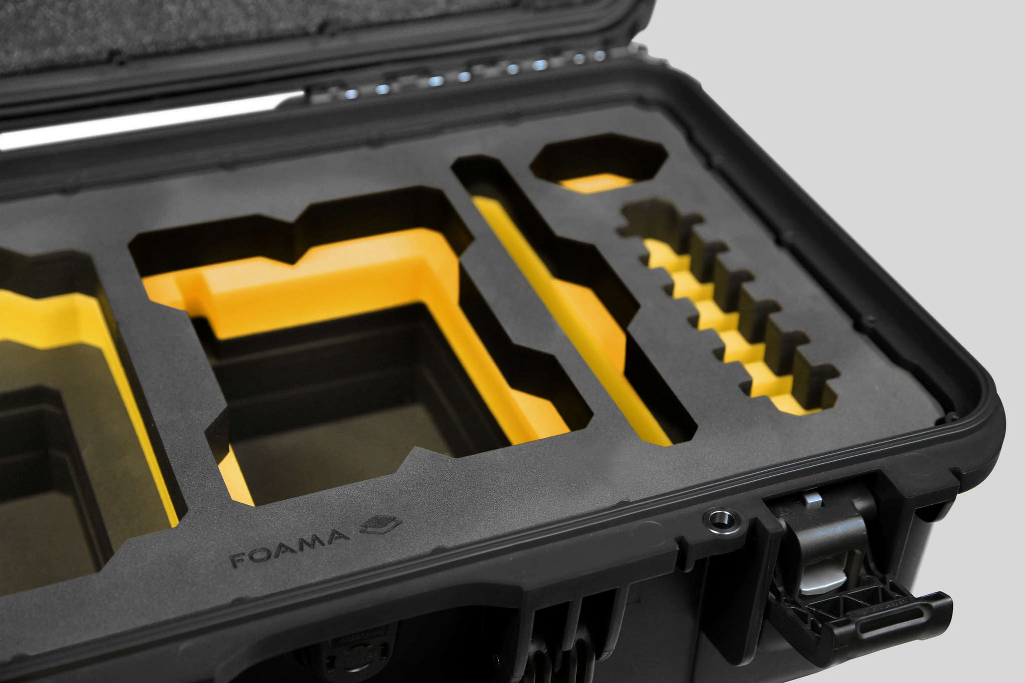 Close-up view 1 of a Red Raptor-X Black Color Carry-on Case with Custom Yellow Foam Insert