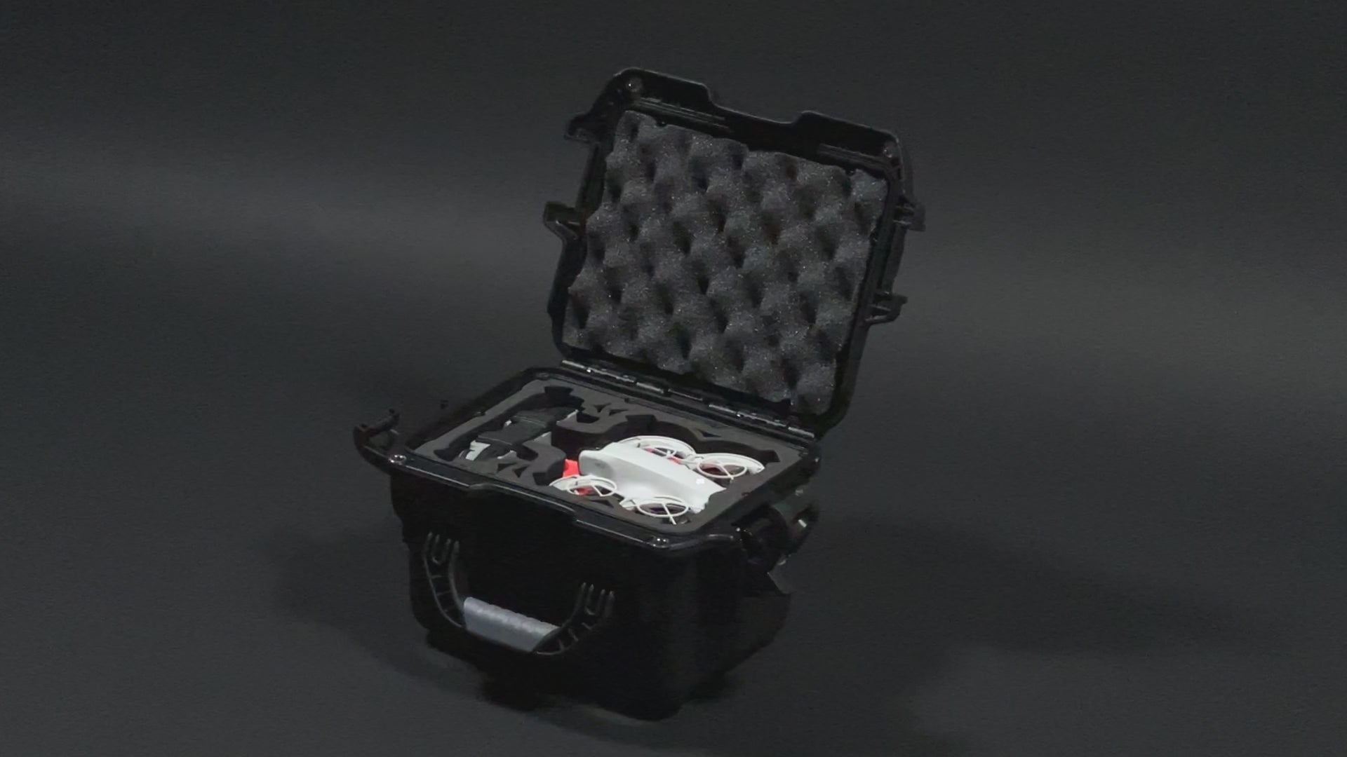 DJI Neo Fly More Combo Case - Black Color Adventure Ready Compact Waterproof Carry-on Case and Custom Foam Insert with a Red Layer, holding